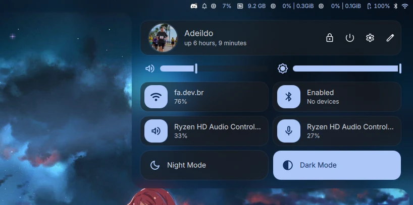 The DMS control center with volume and brightness sliders, Wi-Fi, Bluetooth, audio devices, night mode and dark mode